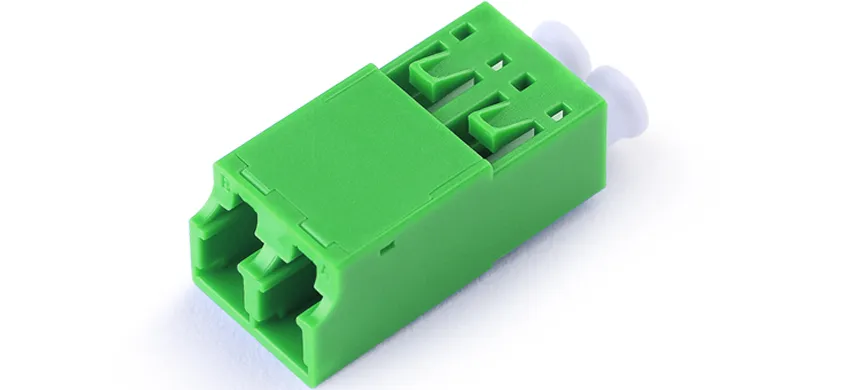 Adapter LC duplex, green housing, white internal shutter, without flange, plastic cover